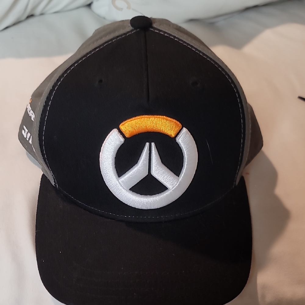 Black and Gray Hat with White and Orange Emblem
